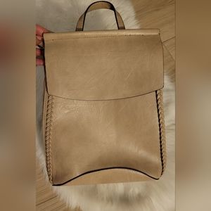 Convertible mini back pack into purse 2 straps turn into 1